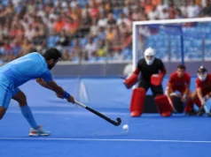 Harmanpreet Brace Powers India Past Wales 3-1 in World Cup Opener Indian field hockey player taking a penalty corner against Wales in an editorial illustration