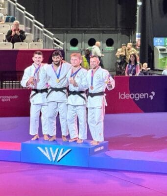 CWG Champion Harsh Singh on Course for Baku World Judo Championships 2026 Harsh Singh with medal winners after winning Commonwealth Games judo gold in Glasgow 2026